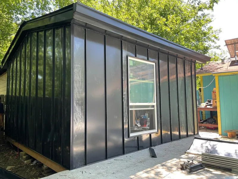 Black standing seam metal wall panels for Roof Inspection in Red Lion